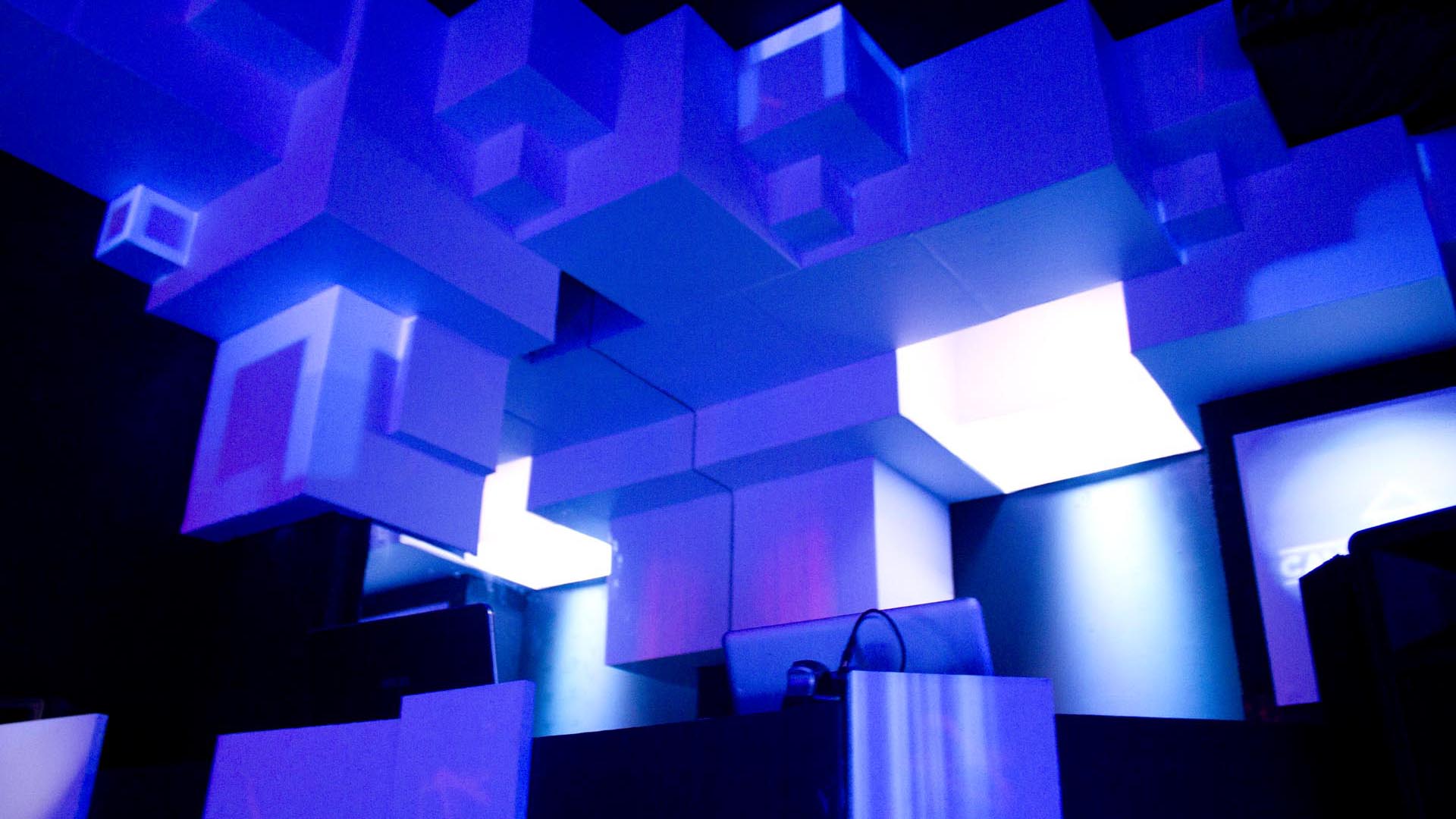 Explore the world of permanent video mapping at Cave Electro, where visuals and lights create a mesmerizing atmosphere.