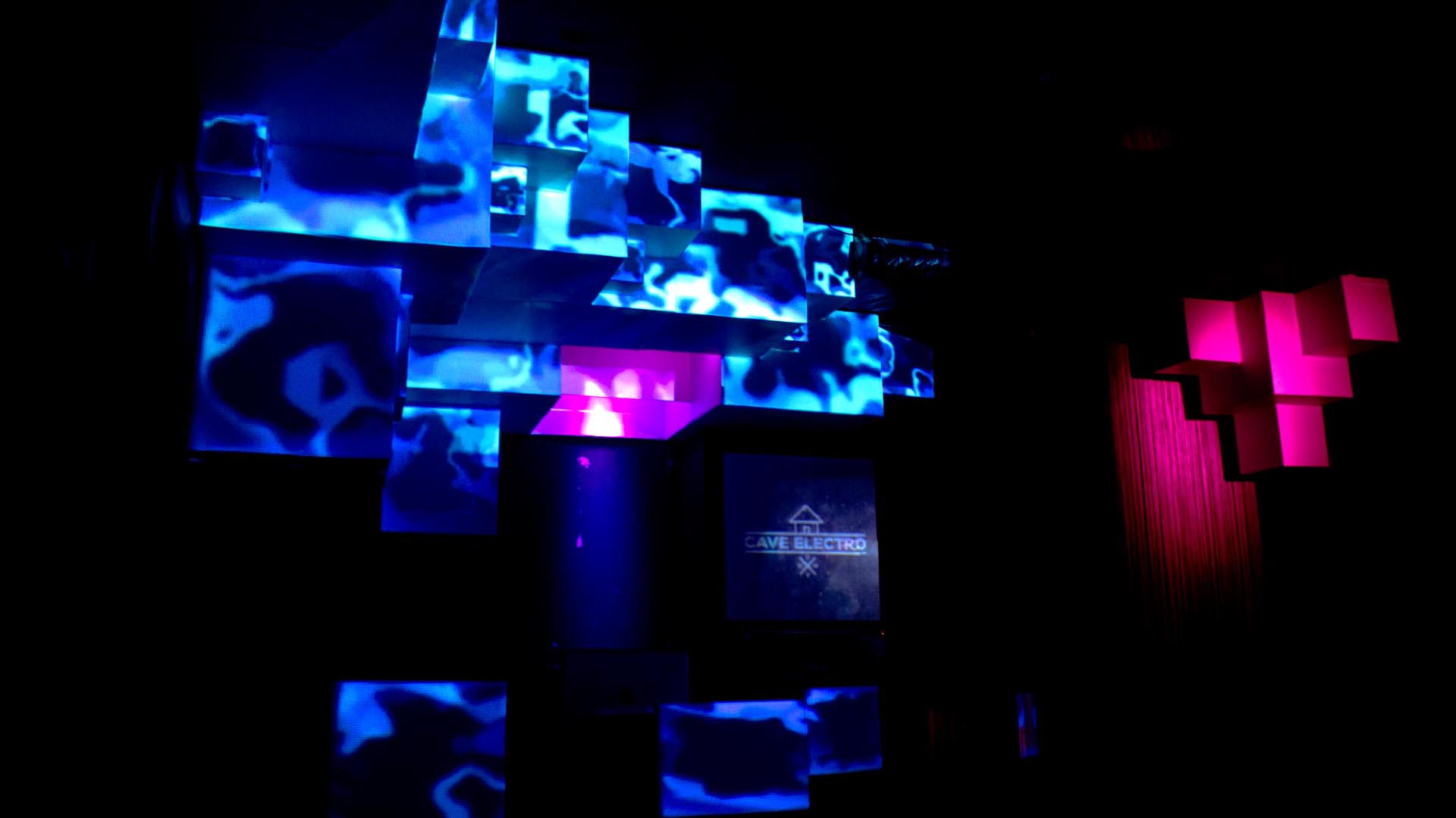 Discover innovative stage design techniques at Cave Electro, featuring permanent video mapping and visuals that dance with the music.