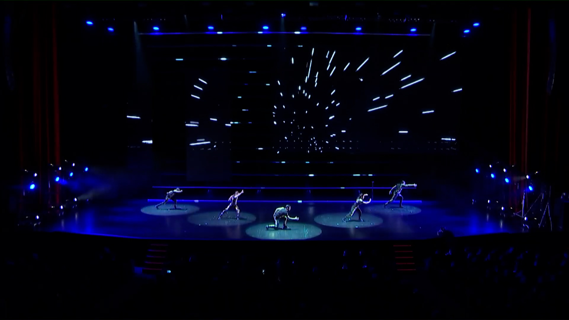 A show featuring choreographed dancers and interactive visuals.